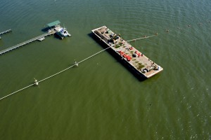 Attaching floats to steel pipeline as it is pulled into the York River for an HDD mid-point installation.