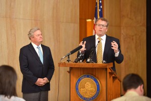 CEO Pat Hughes with Gov. Jack Dalrymple